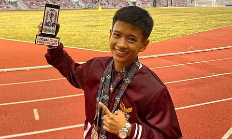 Dabawenya runner Mary Jane Pagayon beams with pride after winning Palaro gold—now set to chase bigger dreams as part of the UP Diliman athletics team.