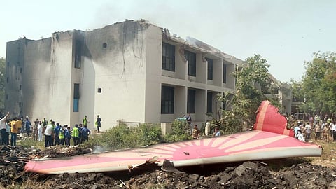 People look at the debris of an Air India plane crashed in Ahmedabad of India's Gujarat state, June 12, 2025. (Xinhua)