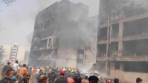 People and rescuers are seen at a site of a plane crash in Ahmedabad of India's Gujarat state, June 12, 2025.  (Xinhua)