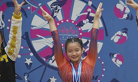 Dabawenya gymnast Aluna Margaux Uy Labrador delivered a podium-worthy performance at the Prime Invitational in Singapore, bagging two bronze medals and helping her team secure silver in a high-level showdown at the Bishan Sports Hall.
