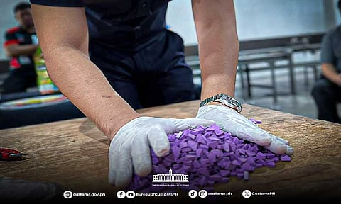 ILLEGAL PARTY DRUGS. The Bureau of Customs Port of Clark, in coordination with the Philippine Drug Enforcement Agency, seized P5.1 million worth of ecstasy or party drugs hidden in dog food. (Photo courtesy of BOC)