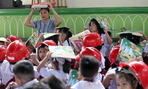 SIGNIFICANT BOOST. Teachers, parents, and students join the second-quarter earthquake drill at Rafael Palma Elementary School in Manila on June 19, 2025. The Department of Education on Thursday (June 26) said the additional 20,000 new teaching positions that are ready for deployment serve as a “considerable” boost to the country's public education. (PNA photo by Yancy Lim)