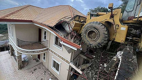 Payloader crashes into house in Busay