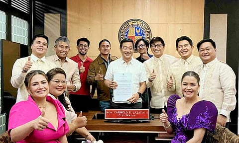 Newly-installed Angeles City Mayor Carmelo "Jon" Lazatin II shows a copy of his first executive order suspending the collection of environmental fees from water consumers in connection with the implementation of Ordinance Providing For The Water Quality And Septage Management System in Angeles City. Lazatin was accompanied by the new city vice mayor, Amos Rivera, and the new and reelected councilors. | Photos by Angeles City Information Office
