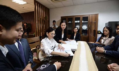 CYBER LIBEL COMPLAINT. Senator Risa Hontiveros (in white) on Wednesday (July 2, 2025) files an official complaint before the National Bureau of Investigation against the personalities behind the viral video of former Senate witness Michael Maurilio. Hontiveros said she is seeking the NBI's assistance in unmasking and charging those behind the video, which features false claims by Maurilio on the Senate‘s investigation of crimes related to Apollo Quiboloy, and undue disclosure of personal information of other witnesses and certain Senate staff. (Photo courtesy of OS Hontiveros)

