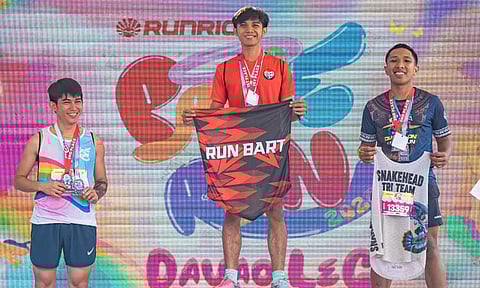 PRIDE RUN TOP 10K FINISHERS. Incoming University of Mindanao freshman Sean Ebenezer Rentuma (center), the 10K champion, leads the top finishers of the recently concluded RunRio Pride Run Davao at the SM Lanang Premier grounds.
