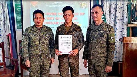 ILOILO. Private Rey Justin Dagsan of the 61st Infantry (Hunter) Battalion receives a Letter of Commendation at Tacas Patrol Base in Valderrama, Antique, on July 2, 2025, for saving a young boy from electrocution in Barangay Lublub. 