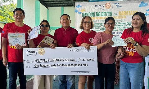 NOURISHING BACOLOR CHILDREN
Rotary Clubs under Cluster 4-A of District 3790 turn over the cheques for the 120-day feeding program to Maliwalu Elementary School during the launch on Tuesday, July 1. - Princess Clea Arcellaz