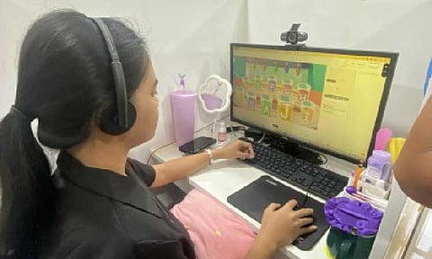 DIGITAL CAREER. Princess Nicole Recto teaches online classes to students from other countries in an office near her home in Barangay Malubi, Aroroy, Masbate on July 3, 2025. Recto is a beneficiary of the Digital Transformation Center, a public-private partnership that provides free digital training to generate more employment opportunities within the community. (PNA photo by Connie Calipay)