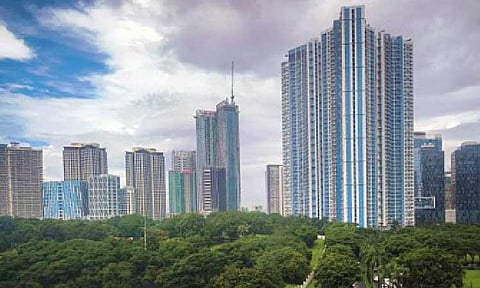 WAGE INCREASE. The skyline and business district of the Bonifacio Global City in Taguig City, in this photo taken on Oct. 4, 2024. The Department of Labor and Employment (DOLE) said Friday (July 4, 2025) it would inspect various establishments in Metro Manila to check their compliance with the PHP50 wage increase for minimum wage earners. (PNA photo by Joan Bondoc)