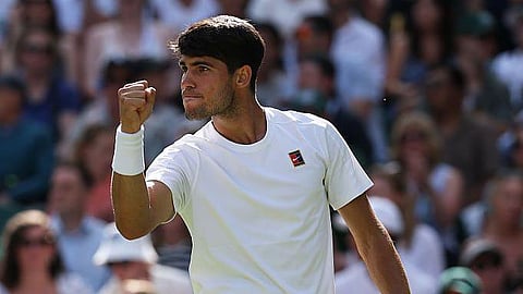 Defending champ Alcaraz advances to 4th round