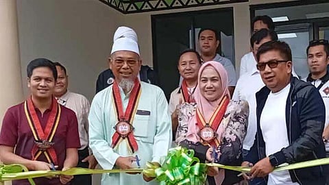 ZAMBOANGA. Basilan Governor Mujiv Hataman (right) joins officials of the Ministry of Public Works-Basilan District Engineering Office and Basilan State College (BaSC) in the inauguration of two newly-cinstructed dormitories at the BaSC-Sta. Clara Campus in lamitan City on Wednesday, July 16, 2025. The two dormitories building that can accommodate up to 200 students. (SunStar Zamboanga)
