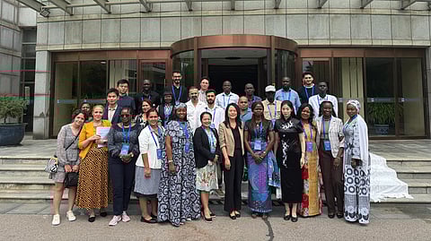 Zhou Jihong, director general of the International Cooperation Department of China’s National Radio and Television Administration (NRTA), joins nearly 30 delegates from 10 countries in a photo opportunity after her talk on the development of China’s media industry and international cooperation. The session was part of the “Journalist Leaders and Gen Z Young Leaders from Belt and Road Countries Seminar,” held on July 8, 2025, at the NRTA’s Research and Training Institute. 