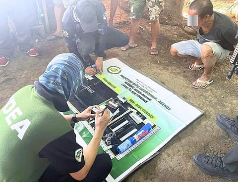 ZAMBOANGA. Philippine Drug Enforcement Agency (PDEA) operatives backed by policemen arrest four individuals as they dismantle a drug den in an anti-drug operation in the Bangsamoro Autonomous Region in Muslim Mindanao’s province of Lanao del Sur on Friday, August 1.