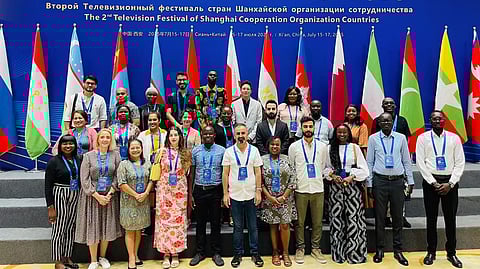 OFFICIAL PHOTO. All 27 delegates of the Journalist Leaders and Gen Z Young Leaders Seminar for Belt and Road countries pose for our first official group photo, taken just before the formal opening of the Shanghai Cooperation Organization (SCO) TV Festival at the Xi’an International Convention Center (XICC). 