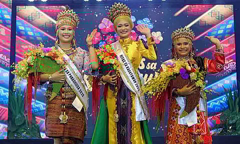 OUR HIYAS SA KADAYAWAN IS... Sittie Norhanna Sangcaan of the Maranao Tribe (center) is this year’s Hiyas sa Kadayawan. Hiyas sa Panaghiusa is Catherine Kate Oda of the Bagobo-Tagabawa (left) while Hiyas sa Kalambuan is Jovie Otahi from the Ata Tribe (right). The Hiyas sa Kadayawan 2025 coronation night was held on Thursday, August 14 at the University of Southeastern Gymnasium at Obrero, Davao City.