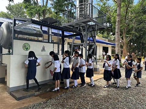 Students line up to fill their bottles with safe, clean water from the newly-installed Skyhydrant Ultrafiltration facility.