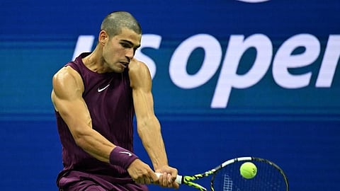 Buzz-cut Alcaraz advances