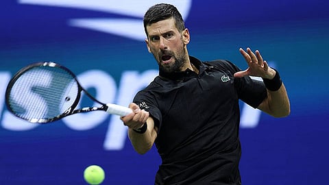 Djokovic shakes off back problem