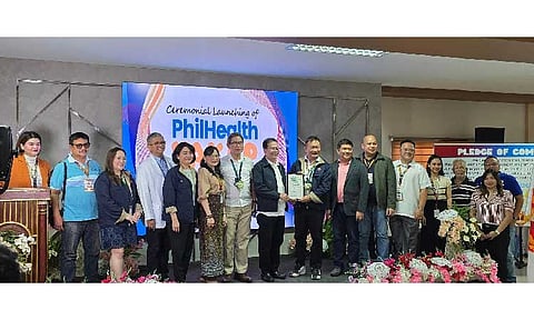 NOW A YAKAP CLINIC. PSU President Dr. Enrique G. Baking accepted the Yakap clinic accreditation from PhilHealth Acting Vice President Henry V. Almanon on Aug. 29. With them were ARTA Director General Ernesto V. Perez and university and PhilHealth officials. (Photo courtesy of PhilHealth)
