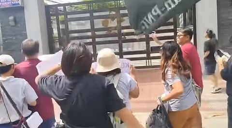 MANILA. Disaster survivors and environmental groups stage a protest at the office of St. Gerrard Construction in Pasig City on Thursday, September 4, 2025, over alleged irregularities in flood control projects.