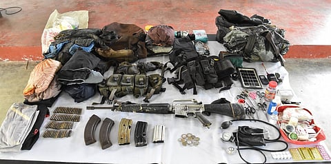 CAPIZ. Philippine Army soldiers from the 61st Infantry (Hunter) Battalion recover firearms and personal belongings following the encounter that killed Christine May Capaducio, an identified CPP-NPA medic, in Sitio Naatip, Barangay Lahug, Tapaz, Capiz, on September 13, 2025. 
