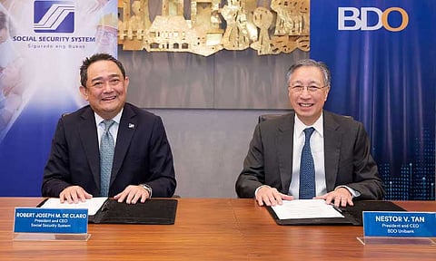 PARTNERSHIP. Robert Joseph Montes de Claro, President and CEO of SSS and Nestor V. Tan, President and CEO of BDO Unibank Inc. at the ceremonial signing, forging a partnership built on shared commitment to financial sustainability and national development. The two leaders shared a warm and cheerful moment after the ceremony.
