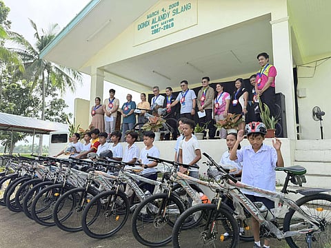Students from Tayabas City proudly receive bicycles sponsored by EastWest Rural Bank through Project TIPA (Tailoring Inclusivity through Provision of Access), an initiative aimed at improving educational access and reducing school absenteeism for students in remote areas.