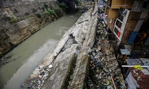 Damaged portion of Tullahan River revetment wall in Quezon City. (PNA photo by Joan Bondoc)