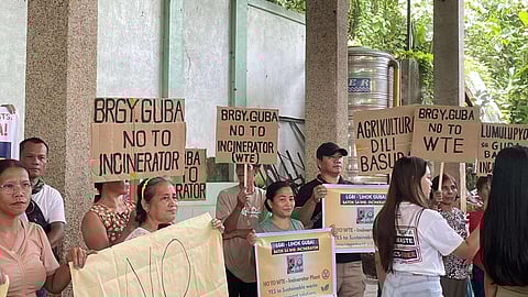 Residents and barangay officials of Guba hold a press conference and public hearing on Monday, September 29, 2025, at the barangay hall to voice their opposition to the proposed P5-billion waste-to-energy (WTE) incineration project. (Cherry Ann Virador)