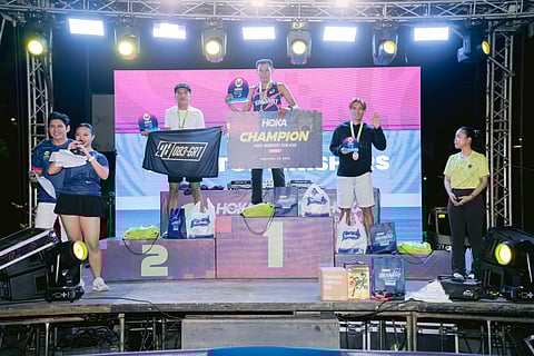 CHAMP AGAIN. Elmer Bartolo of Davao City, center, clinches the men’s 21K crown at the Hoka Midnight Run Asia Davao, which concluded early Sunday morning, September 25, 2025, at the Davao Global Township in Matina.