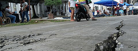 Photo showing visible cracks on an asphalt road near the Cebu Provincial Hospital in Bogo City, Cebu, following the powerful Magnitude 6.9 earthquake that struck the province on Tuesday night, September 30, 2025.