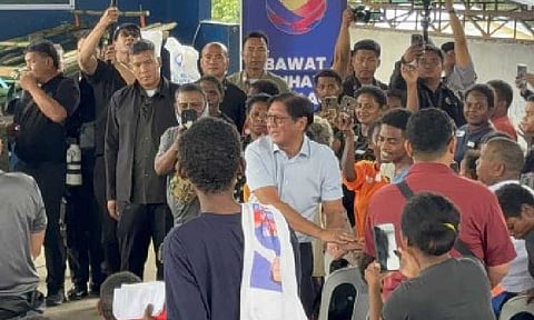 AID DISTRIBUTION. President Ferdinand R. Marcos Jr. leads the distribution of livelihood assistance to reintegrated Aeta in a ceremony at the Katutubo Village in Porac, Pampanga on Friday (Oct. 3, 2025). Through the assistance, Aeta beneficiaries will have access to life skills and livelihood opportunities to prevent them from returning to the streets. (Photo from Malacañang Press Corps Pool)