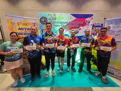 BACK-TO-BACK CHAMPION. Dabawenyo ace Jesrael Rule (fifth from left) proudly holds his trophy after successfully defending his Mixed Open Masters title at the 2nd Metro Cagayan Invitational Open Championships held at SM Game Park, SM Downtown, Cagayan de Oro City.