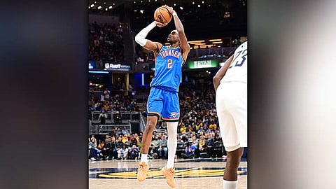 NEW CAREER-HIGH. Oklahoma City Thunder star Shai Gilgeous-Alexander goes for a three-point jumper against the Indiana Pacers en route to scoring a career-high 55 points as OKC won its second straight double-overtime game in Indianapolis. / 