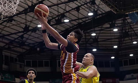 RELENTLESS WILDCAT. Josaiah Villamayor (9) of the Cebu Institute of Technology-University takes it strong to the hoop during the Wildcats losing battle against the University of Cebu Webmasters in the Cesafi men’s basketball tournament.  / 