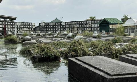 LGU designates common 
sites for flooded cemeteries 
