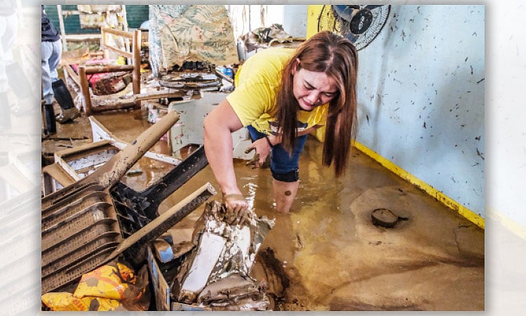 Cebu Teachers Dig Through Mud After Typhoon Tino Ravages School