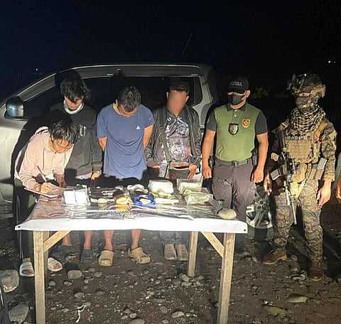 ZAMBOANGA. Lawmen arrest two suspects, including a high-value target (third from left), and seize some P13.7 million worth of illegal drugs in separate anti-drug operations in Zamboanga Peninsula on Saturday, November 8. 