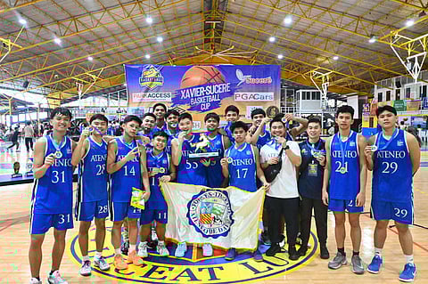 GEARING FOR DCAA TITLE DEFENSE. The Ateneo de Davao University (AdDU) secondary boys basketball team, the Blue Knights, celebrate after capturing the Xavier-Sucere Basketball Cup title on Oct. 29, 2025, in San Juan, Metro Manila. The team is now preparing for the Davao City Athletic Association (Dcaa) Meet 2025, aiming to defend their city and regional titles.