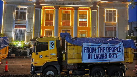 About 16 trucks loaded with relief goods for victims of Typhoon Tino in Cebu Province left Davao City Hall Drive early Wednesday, Nov. 12, 2025.