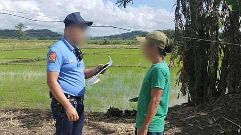 ILOILO. Police from the Anilao Municipal Police Station escort the province’s 3rd most wanted suspect for qualified rape following his arrest in Barangay San Carlos, Anilao, Iloilo.
