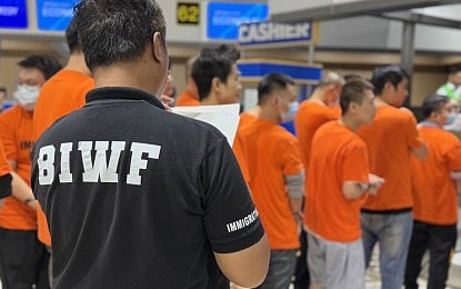 DEPORTED. Twenty-three Chinese nationals involved in the activities of illegal Philippine Offshore Gaming Operators (POGO) and cyber fraud are deported by the Bureau of Immigration on Friday (Nov. 21, 2025). Immigration Commissioner Joel Anthony Viado said the removal of the 23 deportees reaffirms the Marcos administration’s resolve to cleanse the country of foreign nationals involved in illegal activities. (Photo courtesy of BI)