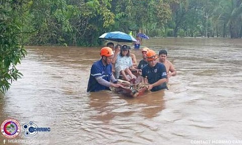 RESCUE OPERATIONS. Emergency personnel evacuate residents in Carrascal, Surigao del Sur on Monday (Nov. 24, 2025). Tropical Depression Verbena displaced nearly 6,000 people across the Caraga Region, with over 15,500 families affected by flooding and severe weather. (Photo courtesy of MDRRMO Carrascal via RDRRMC-13)