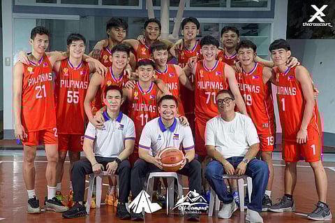 FINALS-BOUND. Players and coaches of Team Philippines, led by Palarong Pambansa champion players from Davao City (Davraa) and reinforced by Central Luzon players, pose for a team photo before facing Malaysia in the boys basketball championship Thursday, November 27, at the Indoor Stadium of the Hassanal Bolkiah National Sports Complex in Brunei.