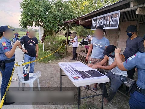 ILOILO. Police operatives arrest high-value individual Poloy Fernandez during a buy-bust operation in Barangay Velasco, Lemery, Iloilo, where officers also seized shabu and other evidence. 