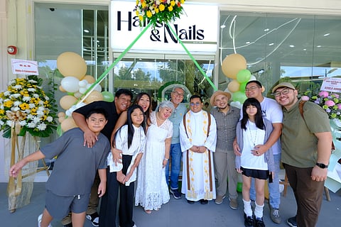 The Congson family, with the priest celebrant, during the Hairs & Nails Salon-Azuela Branch opening on November 29, 2025.