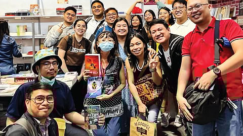 AUTHORS UNITE. The Brothers K with other authors at their publishers booth at the 2025 Manila International Book Fair.