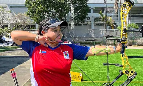 SEA GAMES DEBUT. Kristine Madeline Salomon Ibag of the Philippines focuses on her shot during archery competition at the 33rd Southeast Asian Games in Thailand. The 20-year-old Davao City native made her Southeast Asian (SEA) Games debut, gaining valuable experience and lessons in resilience and mindset.