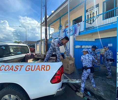 ZAMBOANGA. Personnel of the Coast Guard Station (CGS)-Western Sulu turn over to the Bureau of Customs on Monday, December 29, smuggled cigarettes worth around P840,000 that were seized from a passenger vessel at the port of Jolo, Sulu. 